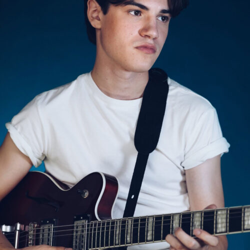 Nathan-Blair-white-tee-guitar-square